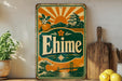 A vintage-style sign for Ehime, featuring a wave, a bridge, and a temple, is displayed on a shelf next to a potted plant and a wooden cutting board.