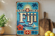 a vintage-style sign for Fiji, with a blue background and tropical elements such as palm trees and a sailboat. The sign also includes the word " Fiji" prominently displayed.