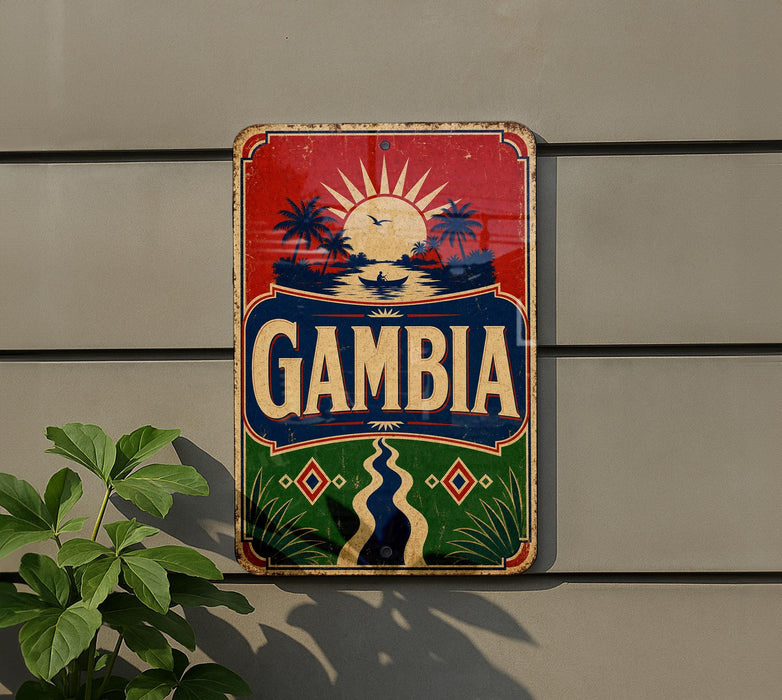 a vintage-style sign with the word "Gambia" prominently displayed, along with a tropical landscape and palm trees.