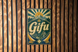 A vintage-style sign with the word "Gifu" displayed prominently in the center, surrounded by a sunburst design and a mountain landscape.
