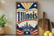 A vintage-style sign for Illinois, featuring a cityscape and a sun-like design, is displayed on a shelf next to a wooden cutting board and some lemons.