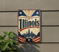 A vintage-style sign with the word "Illinois" prominently displayed, featuring a cityscape and stars in the background.