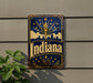 A vintage-style metal sign with the word "Indiana" prominently displayed, featuring a flame and stars against a dark blue background.