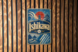 A vintage-style sign for "Ishikawa" is displayed on a wooden wall.