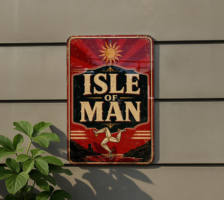 A vintage-style sign with the text "ISLE OF MAN" displayed prominently on a wall, with a sun and a figure of a man in the background.