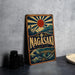 A vintage-style metal sign with a Japanese-inspired design, featuring a sun, mountains, and a castle, along with the text "Nagasaki".