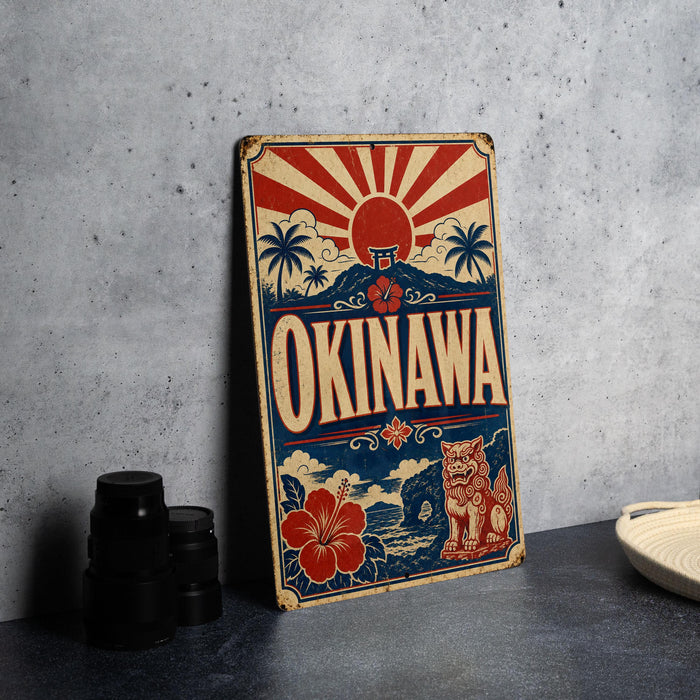 A vintage-style metal sign with a Japanese-inspired design, featuring a sun, flowers, and a lion, is displayed on a gray countertop.