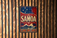 a vintage-style sign with the word "SAMOA" prominently displayed, surrounded by a tropical landscape with palm trees and mountains.