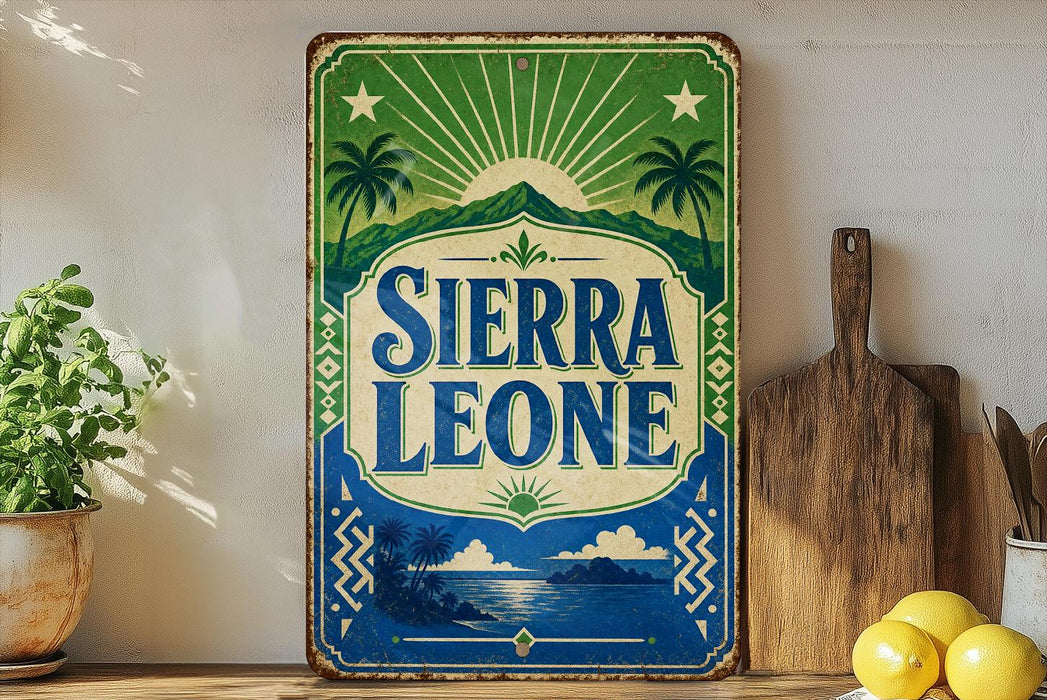 A vintage-style sign for Sierra Leone, featuring palm trees, mountains, and a sun-like design, is displayed on a shelf next to a wooden cutting board and some lemons.