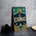 A vintage-style metal sign with a blue and yellow design, featuring a sun, palm trees, and a star, along with the text "The EXUMAS" prominently displayed.