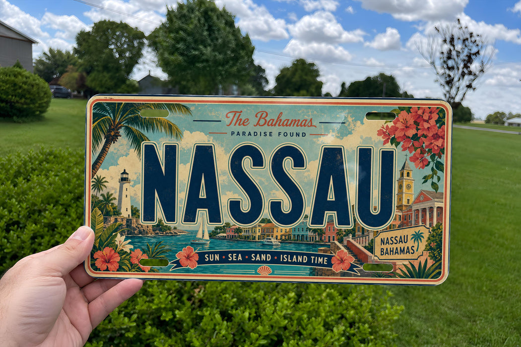 A person is holding a license plate that says "NASSAU" in bold letters, with a tropical island scene on the background.