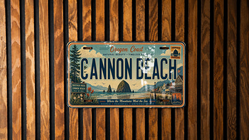 A license plate from Oregon Coast, featuring a scenic illustration of Cannon Beach and surrounding landscape.