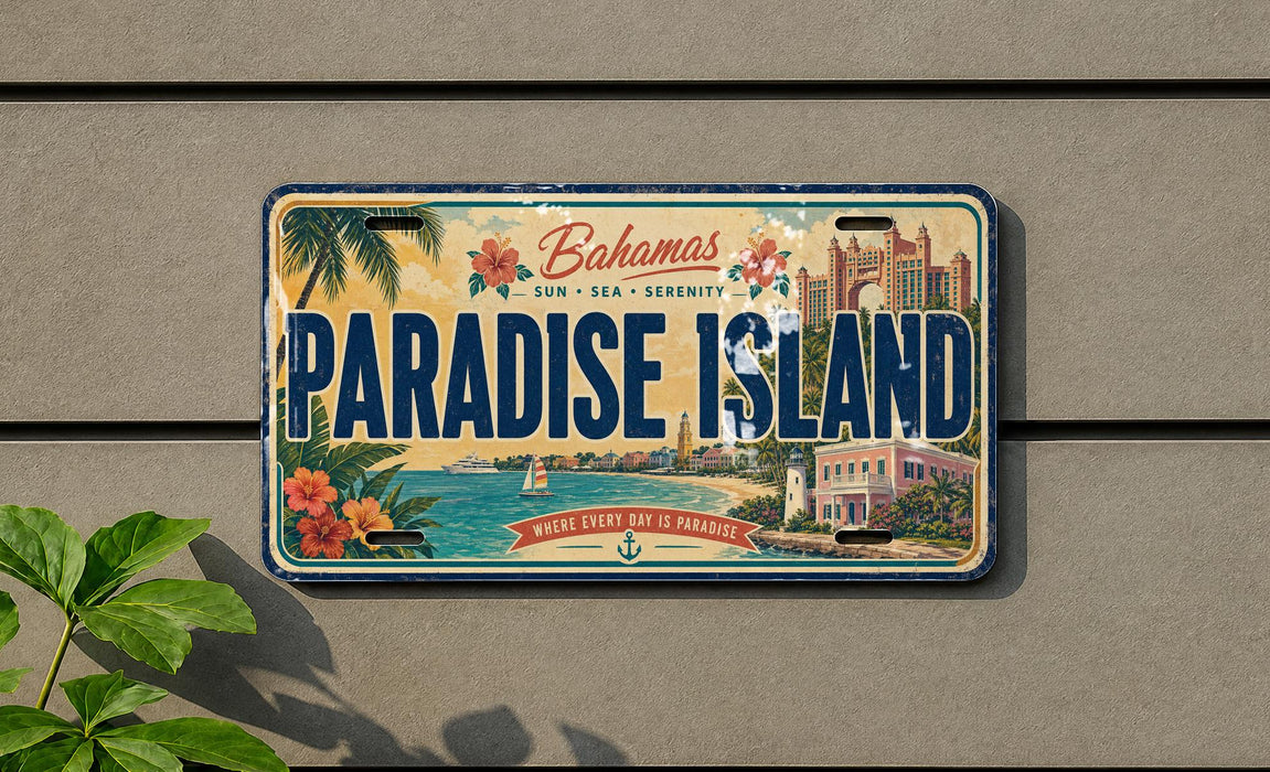 A license plate with the text "Paradise Island" and a tropical island illustration, mounted on a wall.