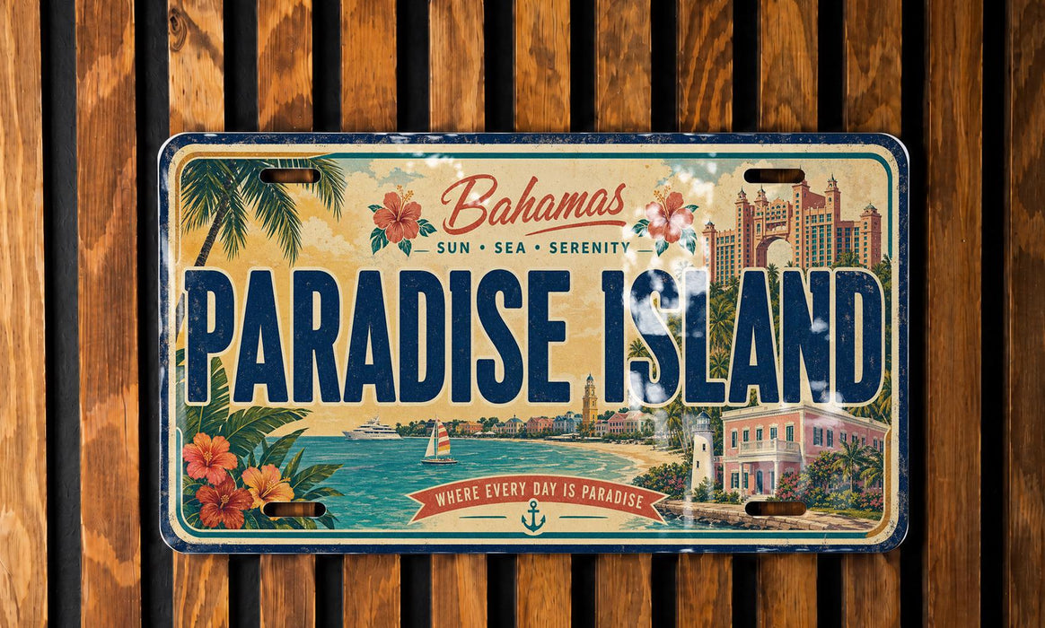 A license plate with the text "Paradise Island" and a tropical beach scene, along with the text "Bahamas" and "Paradise Island" printed on it.