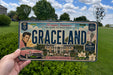 A person is holding a vintage license plate that features an illustration of a classic car and a house, along with the text "Graceland" and "The Home of Elvis Presley".