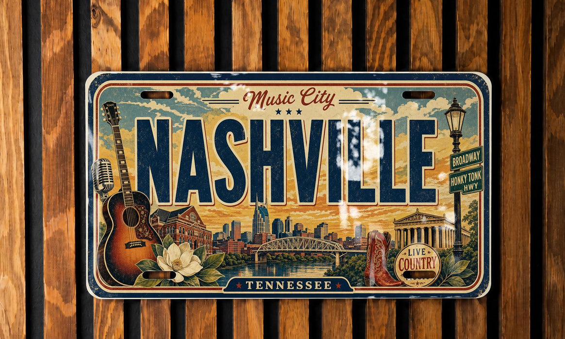 A vintage-style license plate from Tennessee, featuring the text "Music City" and "Nashville" along with various cityscape elements such as a bridge, a guitar, and a flower.