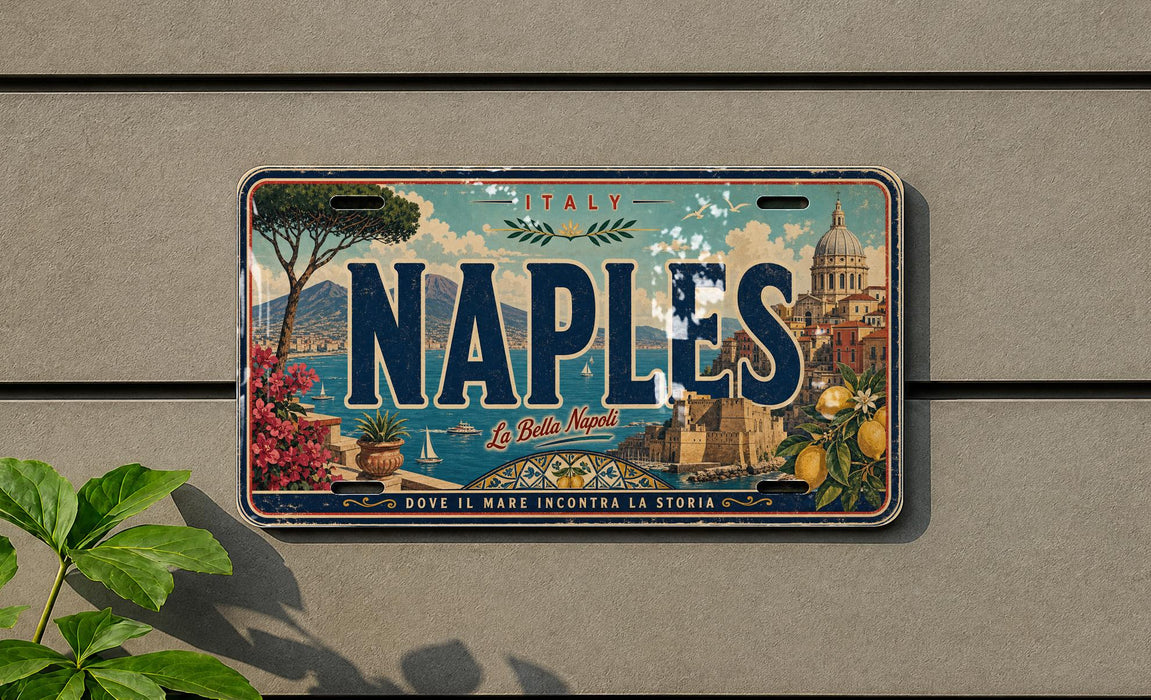 A vintage license plate from Italy that says "NAPLES" and features an illustration of a cityscape with a dome and palm trees.
