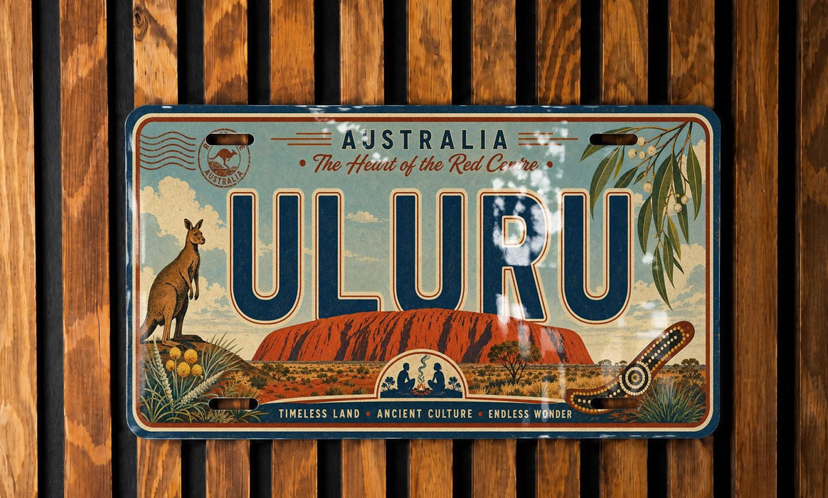 A vintage license plate from Australia with the word "ULURU" prominently displayed.