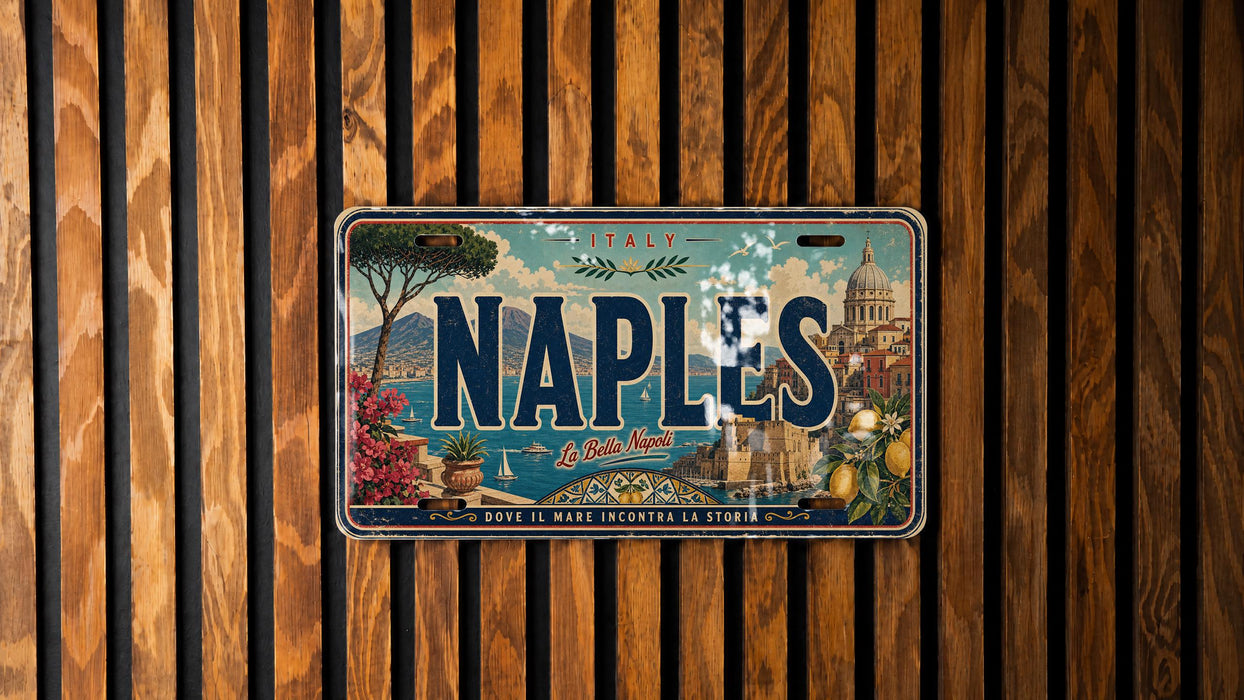 A vintage license plate from Italy with the word "NAPLES" prominently displayed, featuring a scenic illustration of a cityscape and a tree.