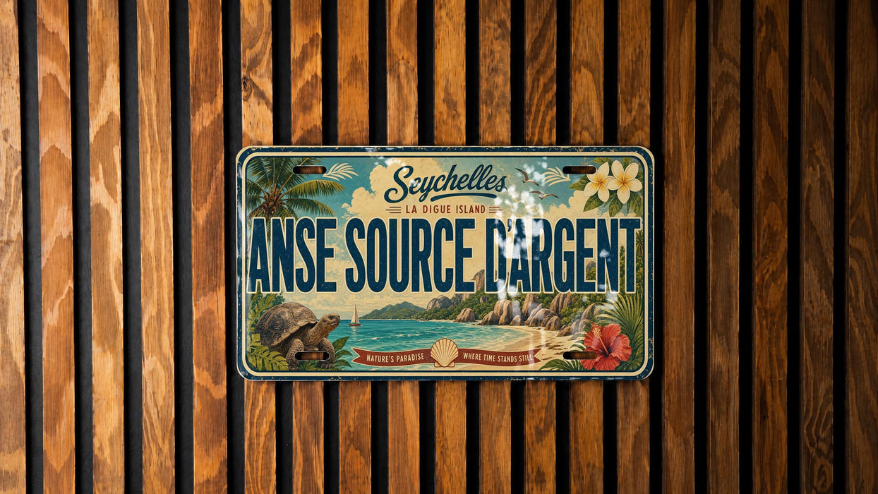 A vintage license plate with a tropical island design, mounted on a wooden wall.