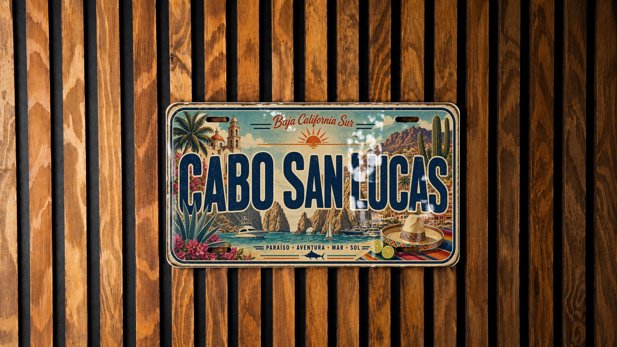 A vintage license plate from California, with the text "CABO SAN LUCAS" prominently displayed.