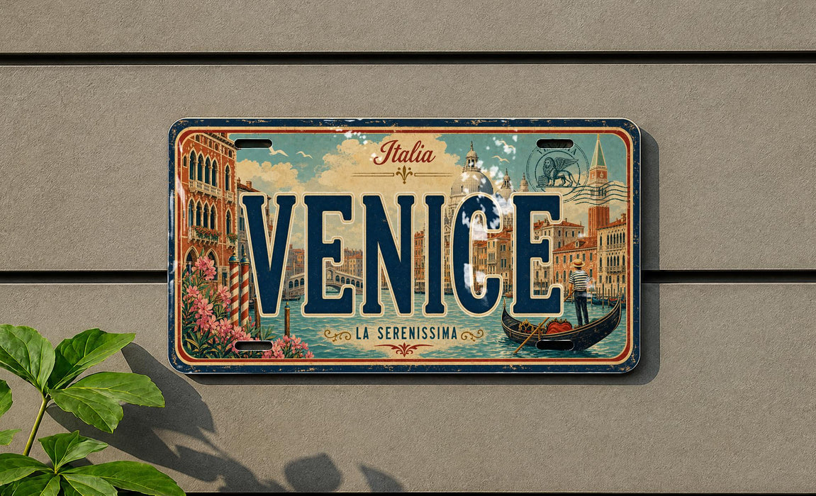 A vintage license plate from Italy that says "VENICE" and features an illustration of Venice, a gondola, and the city's iconic landmarks.