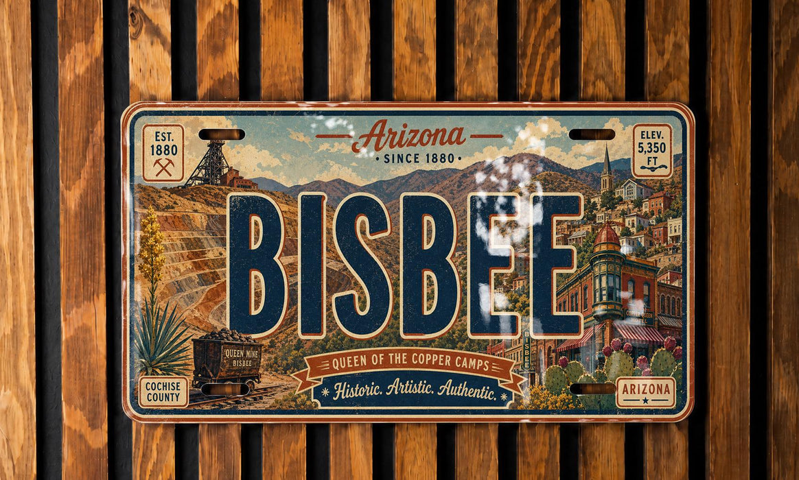 The image is a license plate from Arizona, featuring the word " Bisbee" prominently displayed. The plate also includes various illustrations and text elements related to the state of Arizona, such as the location "Cochise County" and the phrase "Queen of the Copper Camps".