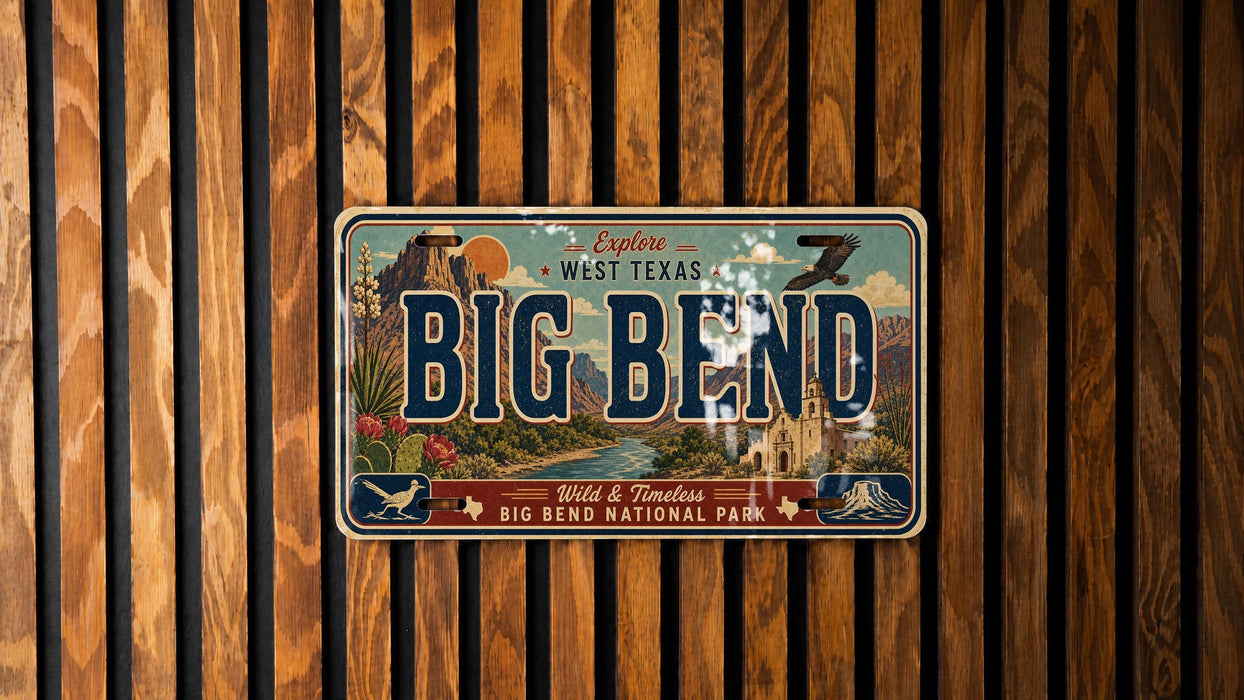 A vintage-style license plate with the text "BIG BEND" and "Wild & Scenic" printed on it, mounted on a wooden wall.