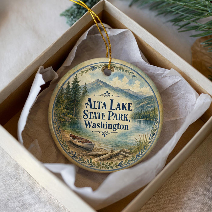 A decorative ornament in a white box, featuring a scenic image of Alta Lake State Park in Washington.