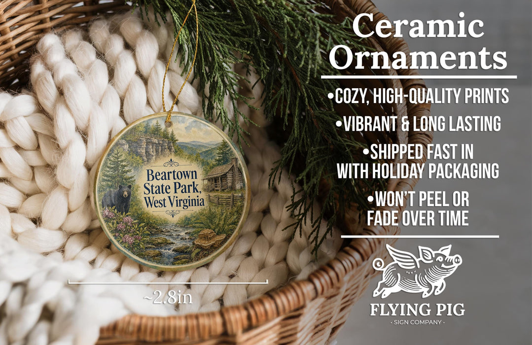 Ceramic ornaments, featuring a round ornament with a scenic image of Beartown State Park, West Virginia, hanging from a wicker basket.