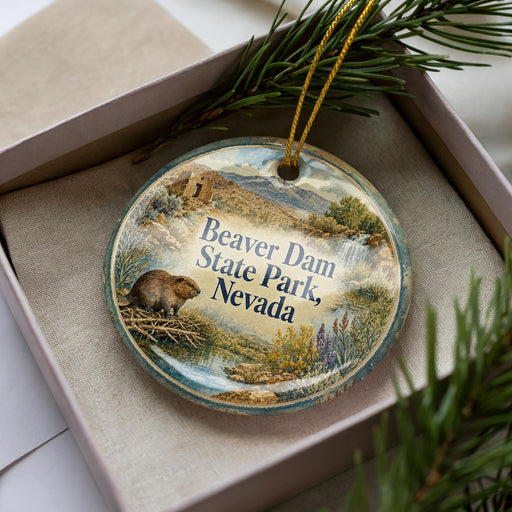 A decorative ornament in a box, featuring a beaver and the text "Beaver Dam State Park, Nevada".