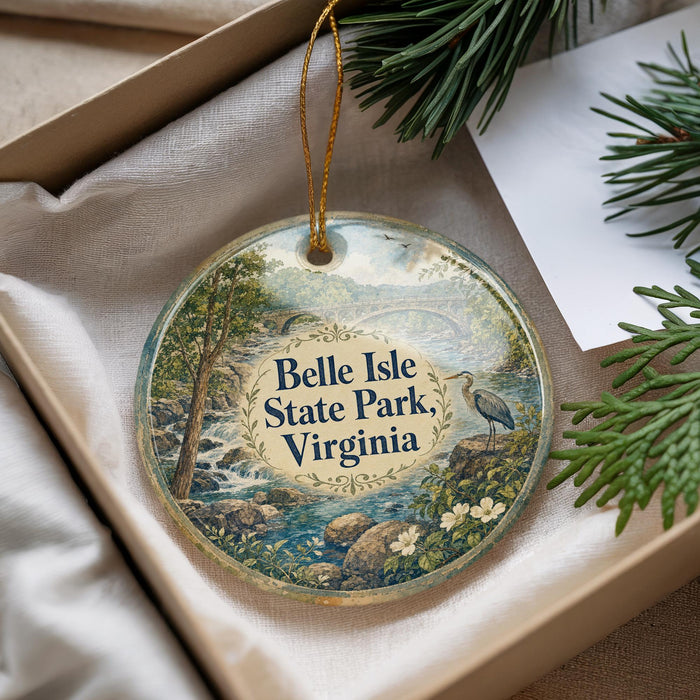 A decorative ornament with a scenic landscape of Belle Isle State Park, Virginia, featuring a bird and water.