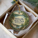A round ornament with a scenic image of Beltville State Park, Pennsylvania, hanging from a string.