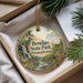 A decorative ornament with a scenic image of Bendigo State Park, Pennsylvania, hanging from a string.