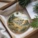 A round ornament with a scenic landscape of Beverly Beach State Park, Oregon, featuring a beach, mountains, and pine trees.