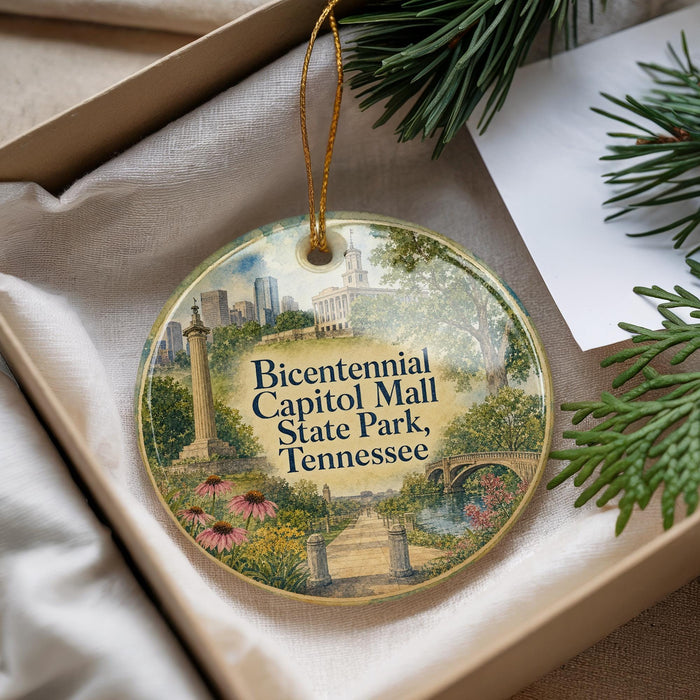 A decorative ornament with a cityscape and greenery, featuring the text "Bicentennial Capital Mall State Park, Tennessee" on it.