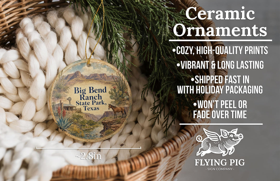 Ceramic ornaments, featuring a hand-painted design of Big Bend Ranch State Park, Texas, hanging from a wicker basket.