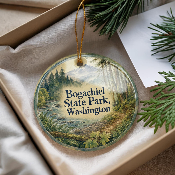 A round ornament with a scenic image of Bogachiel State Park in Washington, featuring a forest and a river.