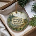 A round ornament with a scenic image of Bogachiel State Park in Washington, featuring a forest and a river.