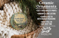 Ceramic ornaments, featuring a Boulder Beach State Park, Vermont ornament hanging in a basket with pine branches.