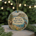 A round ornament with a scenic illustration of Boysen State Park in Wyoming, featuring a mountain landscape, a river, and wildlife.