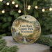 A round ornament with a scenic landscape of Cam-Rock County Park, Wisconsin, featuring a waterfall, bridge, and pine trees.