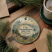 A decorative ornament featuring a lighthouse and a scenic landscape, with the text "Cape Disappointment State Park, Washington" displayed prominently.