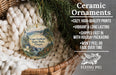 Ceramic ornaments, featuring a lighthouse and a scenic landscape, are displayed in a woven basket.