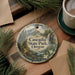 A decorative ornament featuring a scenic landscape of Cascadia State Park, Oregon, with pine trees and a waterfall.