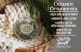 Ceramic ornaments, featuring a design of a mountain landscape with the text "Cascadia State Park, Oregon" and a bird, are displayed in a woven basket.