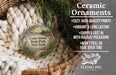Ceramic ornaments, specifically a round ornament with a scenic image of Cedar Island State Park, New York, hanging from a wicker basket.