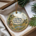 A decorative ornament with a scenic landscape of Chadron State Park, Nebraska, featuring a mountain, river, and pine trees.