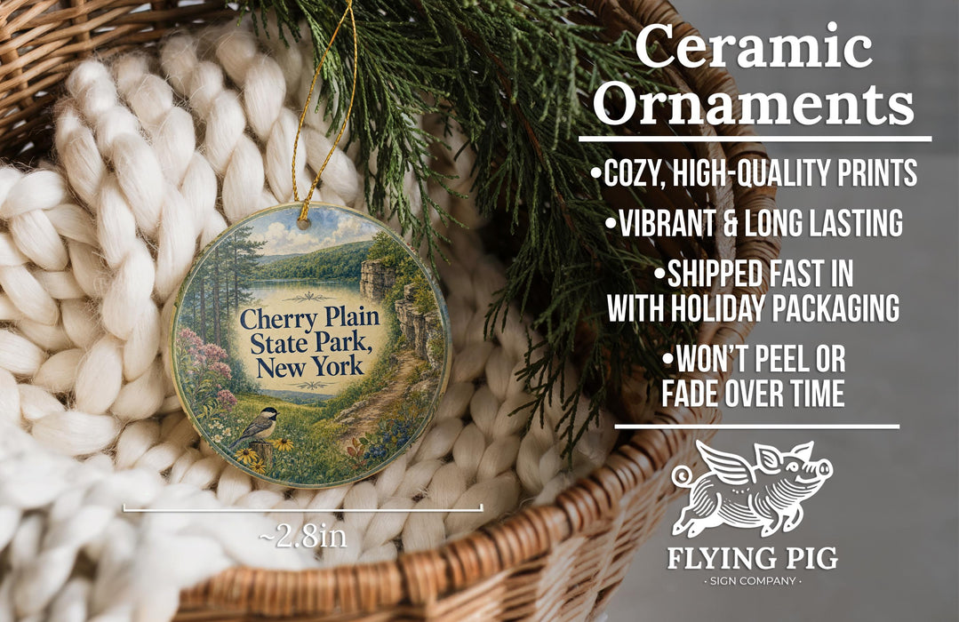 Ceramic ornaments, featuring a scenic image of Cherry Plain State Park, New York, hanging from a wicker basket.