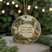 A round ornament featuring a scenic landscape with a waterfall, a bird, and a cabin, with the text "Chief Logan State Park, West Virginia" displayed prominently.